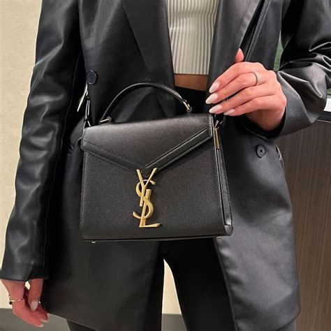 ysl sac mng cassan|CASSANDRA Mini top handle bag in grain de poudre  .